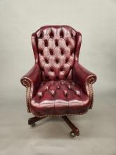 Faux leather tufted arm chair