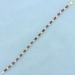 8.5ct Tw Tanzanite Flower Design Line Bracelet In 14k Yellow Gold
