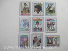 Nine NFL Trading Cards including 8 Topps, 1970 Gale Sayers #70, 1974 Archie Manning #70, 1977 John