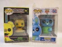 Two Funko Pop! Disney Vinyl Figures including Zero 71 (Nightmare Before Christmas) and Toy Story 4