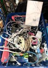 Bin of Cellphone Power Cords, Cases and Battery Power Phone Case