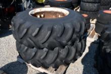 TWO GOODYEAR 16.9-28 TIRES WITH 4 BOLT RIMS