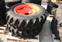 TWO FIRESTONE 13.6-28 TIRES & RIMS WITH 8 BOLT CENTERS (UNUSED)