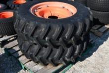 TWO FIRESTONE 12.4-24 TIRES & RIMS WITH 8 BOLT CENTERS (UNUSED)