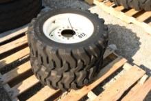 TWO TITAN 25X8.50-14 TIRES WITH 6 BOLT RIMS (UNUSED)