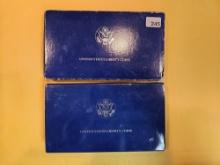 Two 1986 US Silver Proof Commemorative Sets