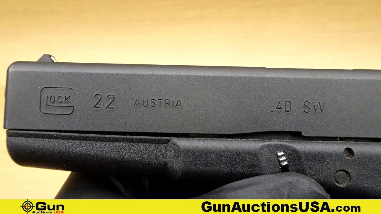 Glock 22 .40 S&W Pistol. Very Good. 4 3/8" Barrel. Shiny Bore, Tight Action Semi Auto Features Check