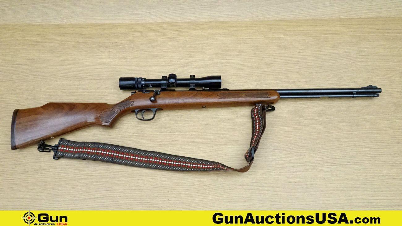 Marlin 883 .22 WMR Rifle. Very Good. 22" Barrel. Shiny Bore, Tight Action Bolt Action Features a Wal