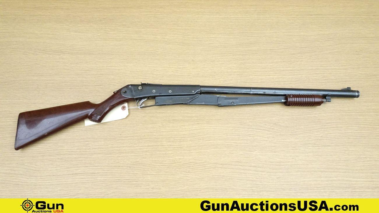 Daisy 25 .177 BB RIFLE. Needs Repair. Pump Action Features a Front Blade Sight, Notch Rear Sight, wi