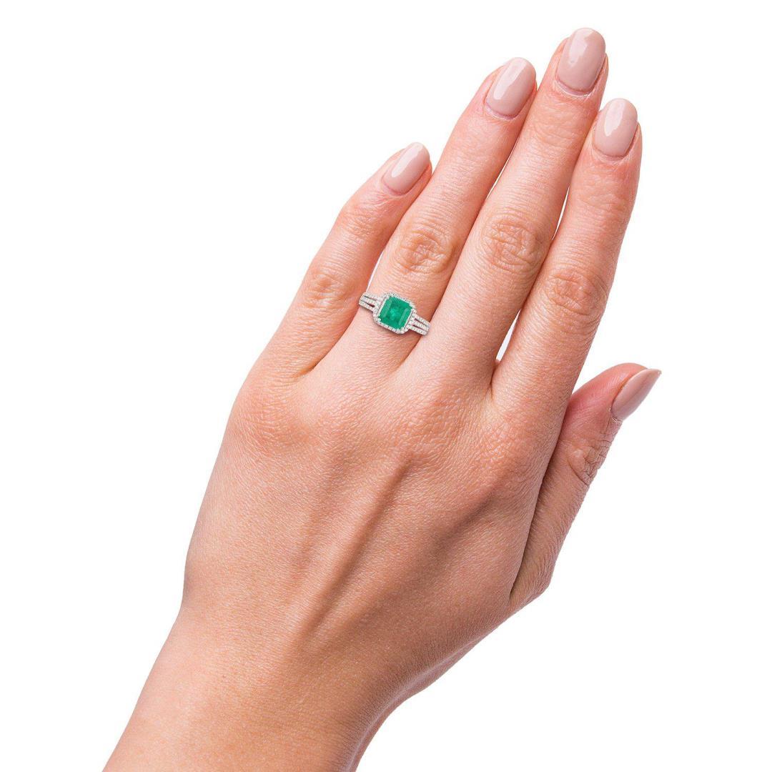 1.59 ctw Emerald and 0.39 ctw Diamond Platinum Ring