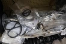 QUANTITY OF TORO LAWN MOWER PARTS INCLUDING BELTS, GASKETS, ETC.