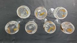 Lot of 7 crystal with gold colered wine glasses