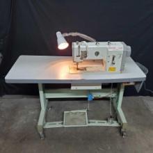 Pfaff 1245 heavy duty sewing machine with rolling desktop adjustable light