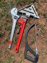 crestant wrench, pipe wrench, saw and square