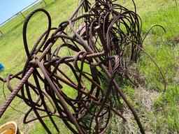 Rusty cables with loops on the end. Rack is included