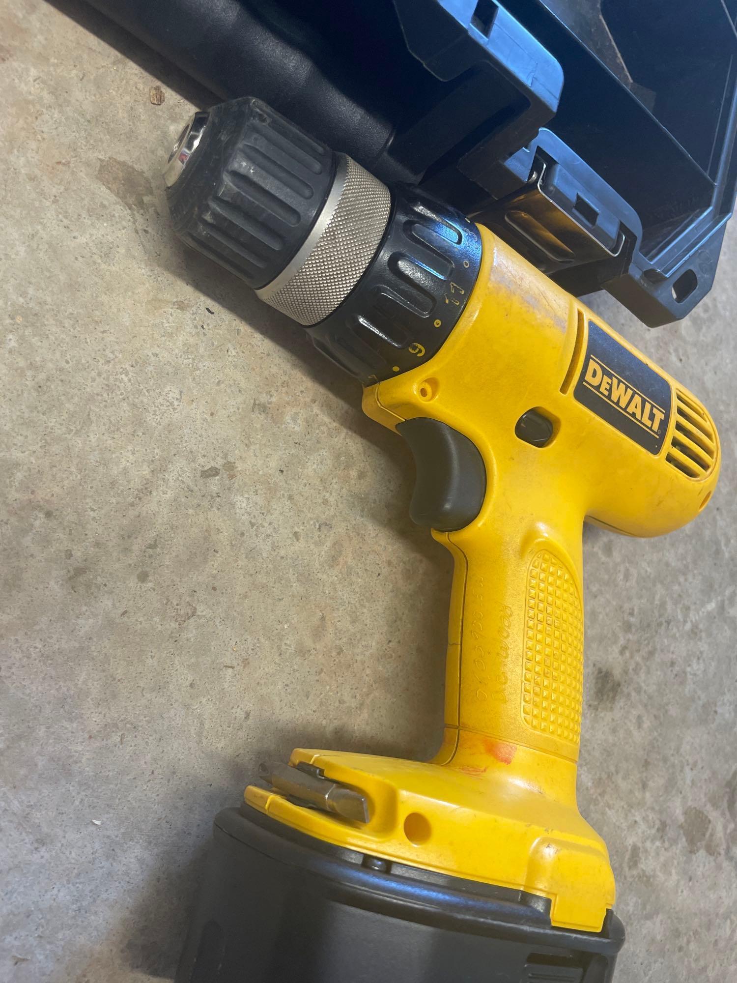 power drill; charger; extra battery