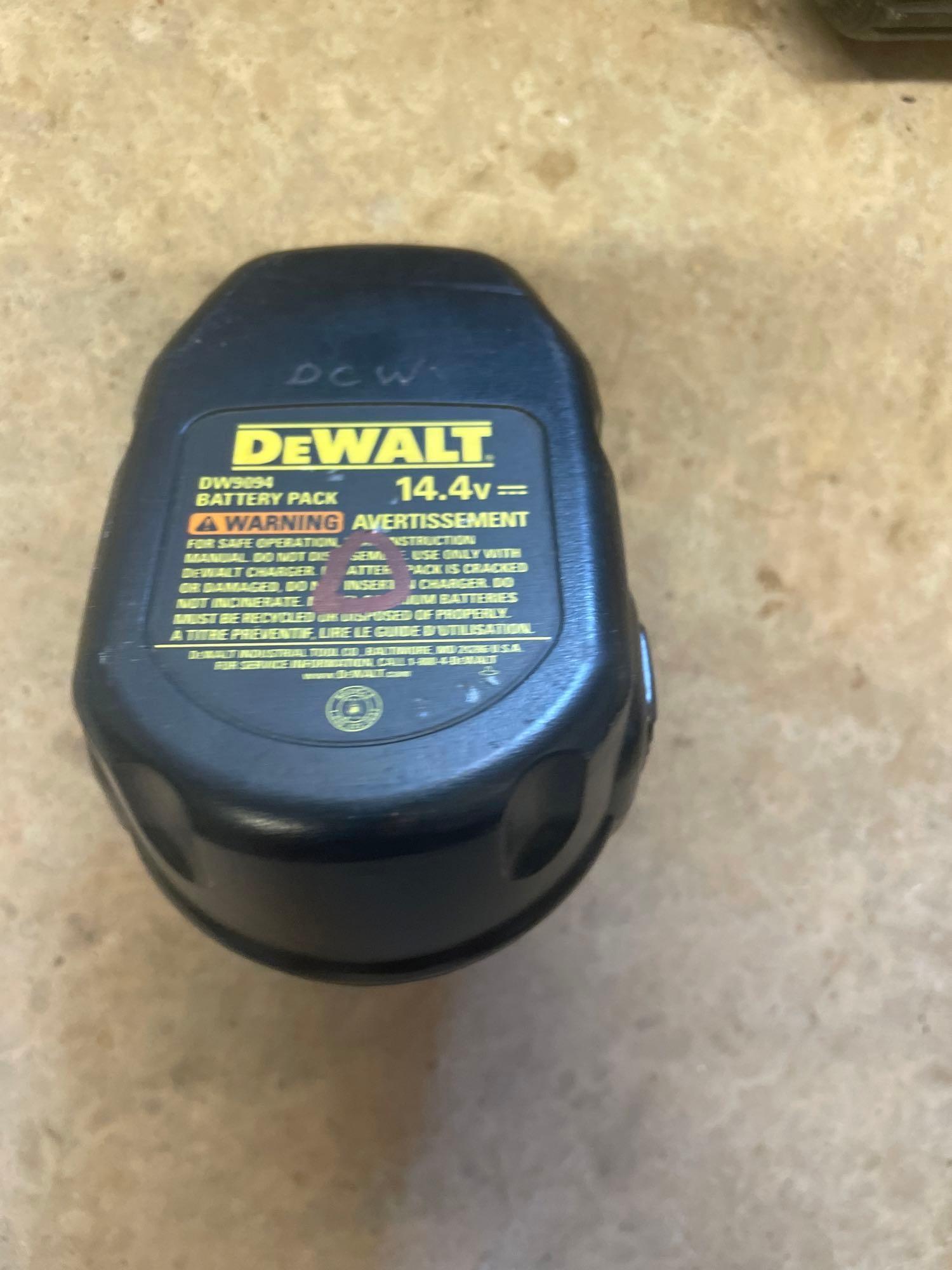 power drill; charger; extra battery