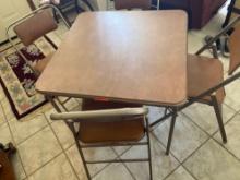 Four chairs and a card table
