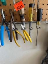 Pliers, pliers and screwdriver