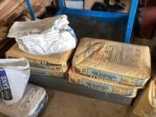 concrete bags and open sand bags