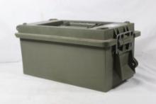 One green plastic ammo can. Used in good condition.