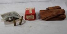 Bag of miscellaneous ammo, box of Hornady 38 cal gas checks and one leather shooting rest, needs