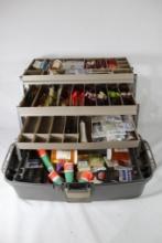 Two toned 3 tray tackle box full of fishing items. Used.