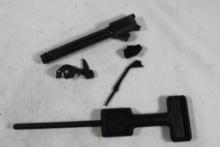 Sig Sauer 9mm threaded barrel, cleaning rod and trigger parts.