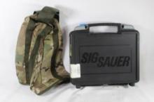 One factory Sig Sauer pistol box and one camo bag.
