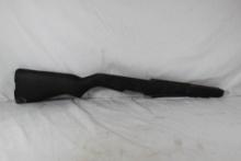 One black wood rifle stock. Looks to be for M1 garand. Used.
