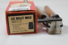 One Lee wood handle single cavity bullet mold for 214 gr SWC 44 cal. Used in box.