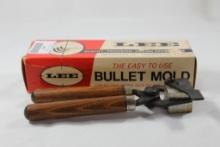 One Lee wood handle single cavity bullet mold 125 gr LRN .356. Used in box.