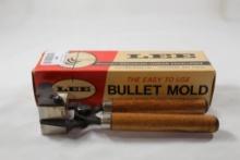 One Lee wood handle single cavity bullet mold 450 gr .457 LFN, for 45 cal rifles. Used in box.