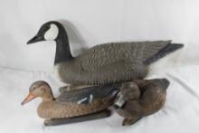 Three waterfowl decoys. One goose and two duck. Used.