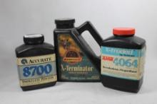 Three bottles of reloading powder. One partial RamShot X-Terminator, one partial accurate 8700 and