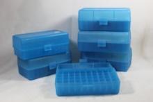 Six clear blue MTM 50 round ammo boxes for small rifle cartridges. Like new.
