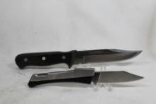Two knives in same sheath. Large fixed blade knife with 5.5 inch blade. Wood and metal handle. Also