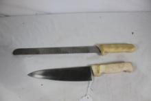 Two kitchen knives. See photo.