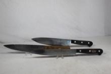 Three Henckels kitchen knives.