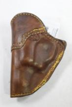 One Browns, dark brown leather belt clip holster for Charter Arms Bulldog. Used. Left handed.