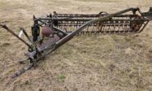 Pull type PTO driven side delivery rake