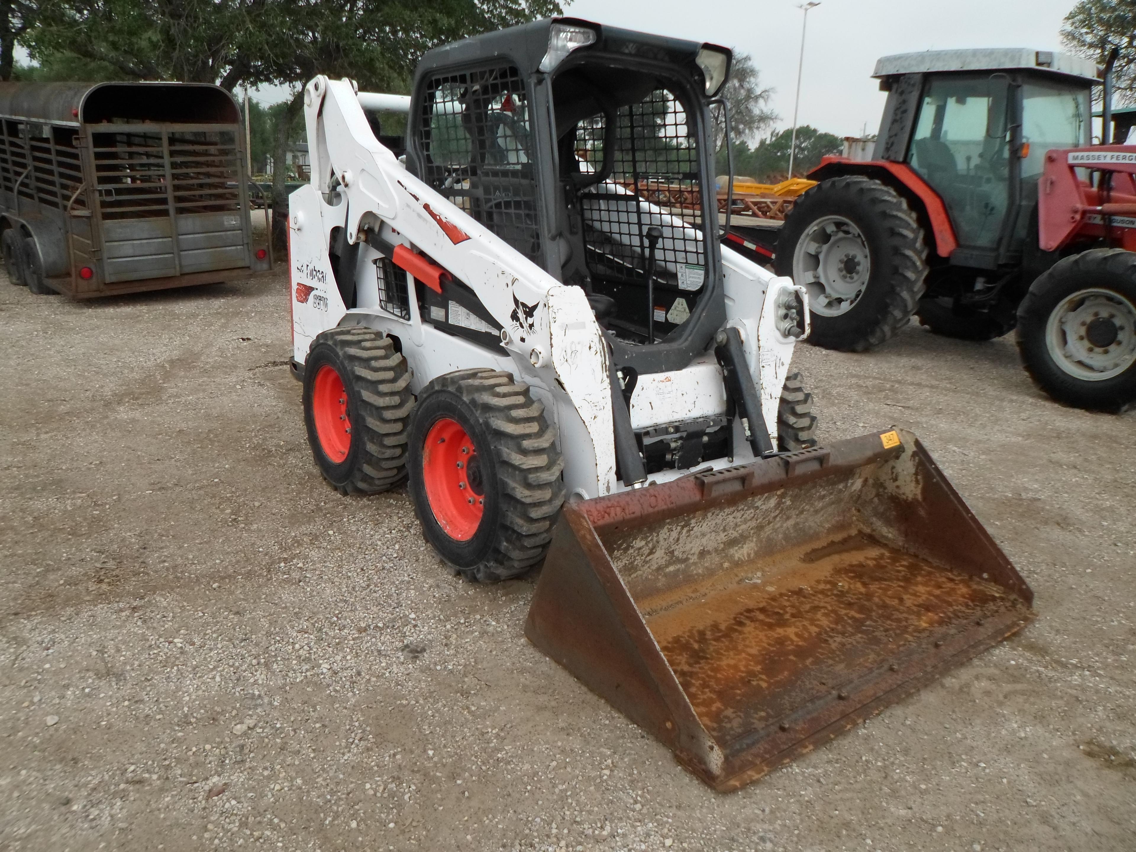 BOBCAT S570 SKID STEER (SERIAL # ALM420054) (SHOWING APPX 1,640 HOURS, UP TO THE BUYER TO DO THEIR D