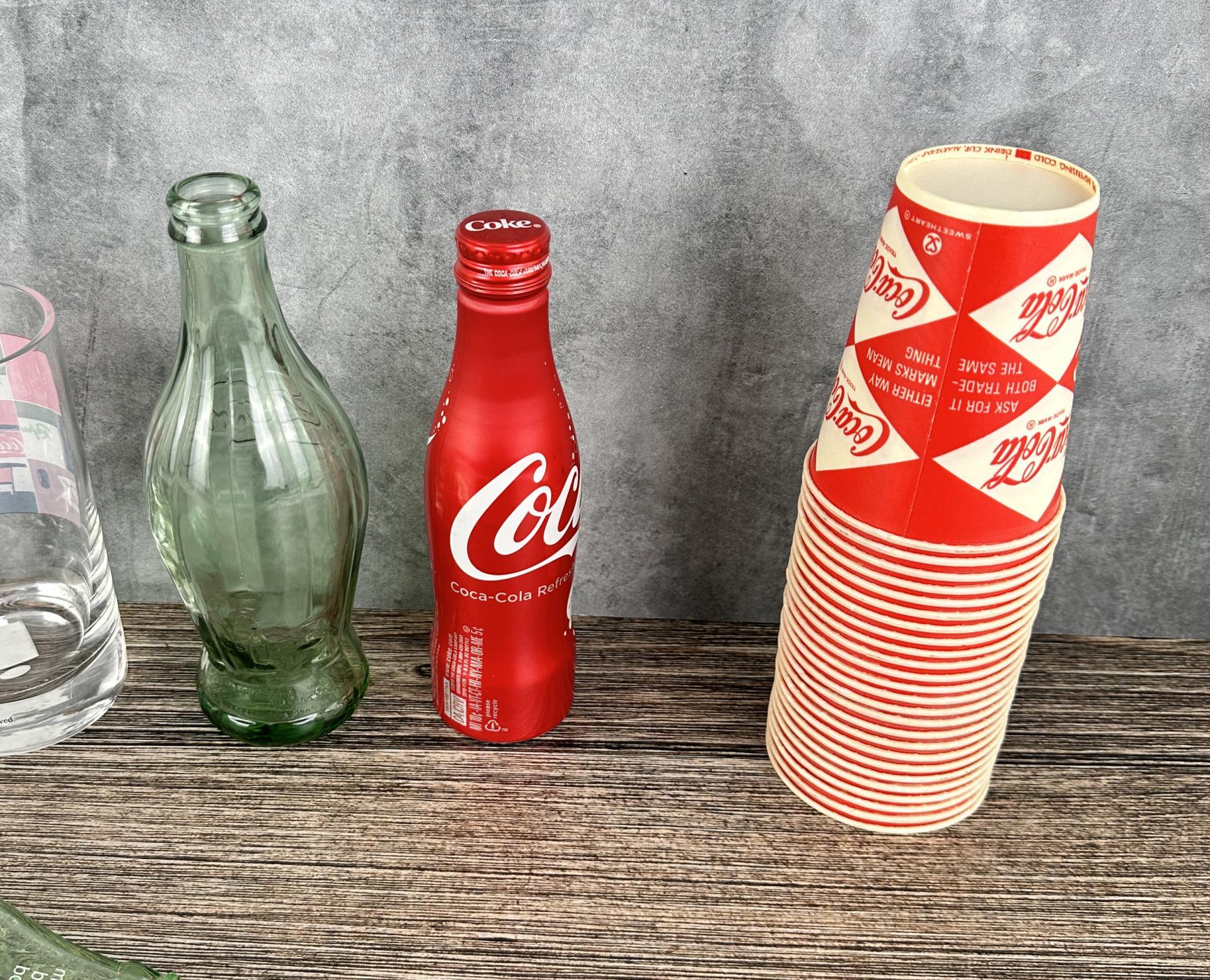 Collection of Coca Cola Cups Bottles Glasses