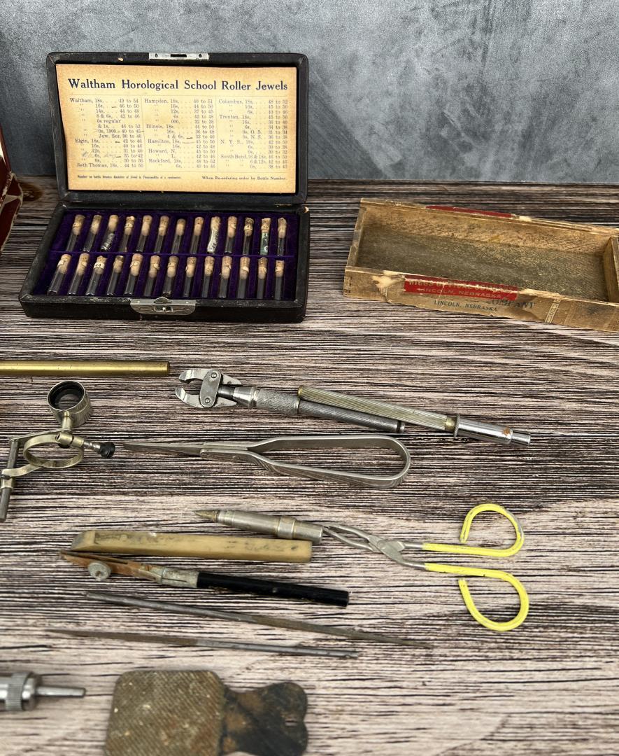 Collection Of Antique Watch Parts And Tools