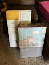 Floor lamp and a magazine rack lamp in boxes
