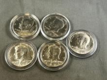 5- Kennedy Half Dollars in Coin capsules