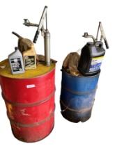 55 Gallon Drums w/ used motor oil includes pumps, misc fluids included