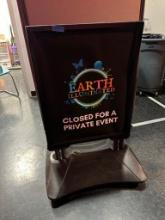 DOUBLE-SIDED SIGN ON STAND