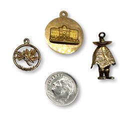 Three Vintage Gold Charms Including Canada and Mexico