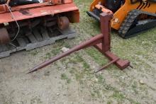 Hay bale spear attachment